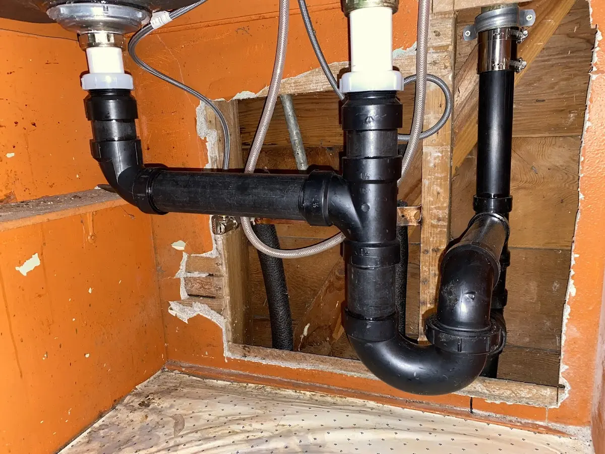 Professional Garbage Disposal Repair equipment and tools on the job in Alexandria